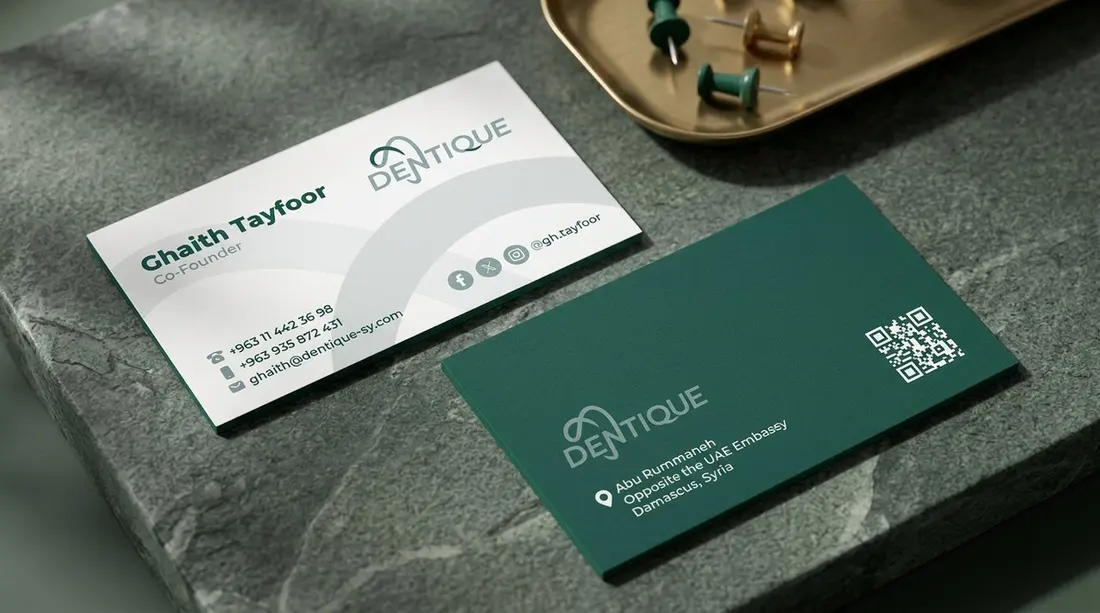 Dentique business cards on stone