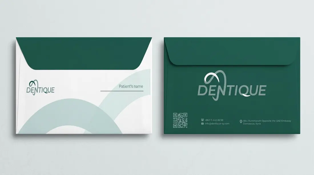 Dentique envelopes in white and green