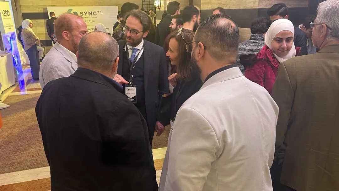 Guests and sponsors networking at SYNC '25
